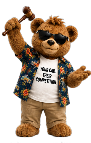 Brown Teddy running the auction with a gavel